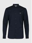 Camisa-de-Corte-Regular-con-Acabado-Liso-Hombre-Tommy-Jeans-DM0DM19519-C1G