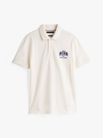 Polo-de-corte-regular-con-logo-bordado-de-hombre-Tommy-Hilfiger-MW0MW37516-Z00