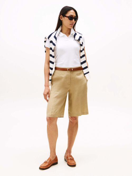 Polo-de-corte-slim-con-logo-script-de-mujer-Tommy-Hildiger-WW0WW45805-YCF