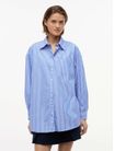 camisa-oversize-de-popelin-tommy-jeans-dw0dw22936-c8p